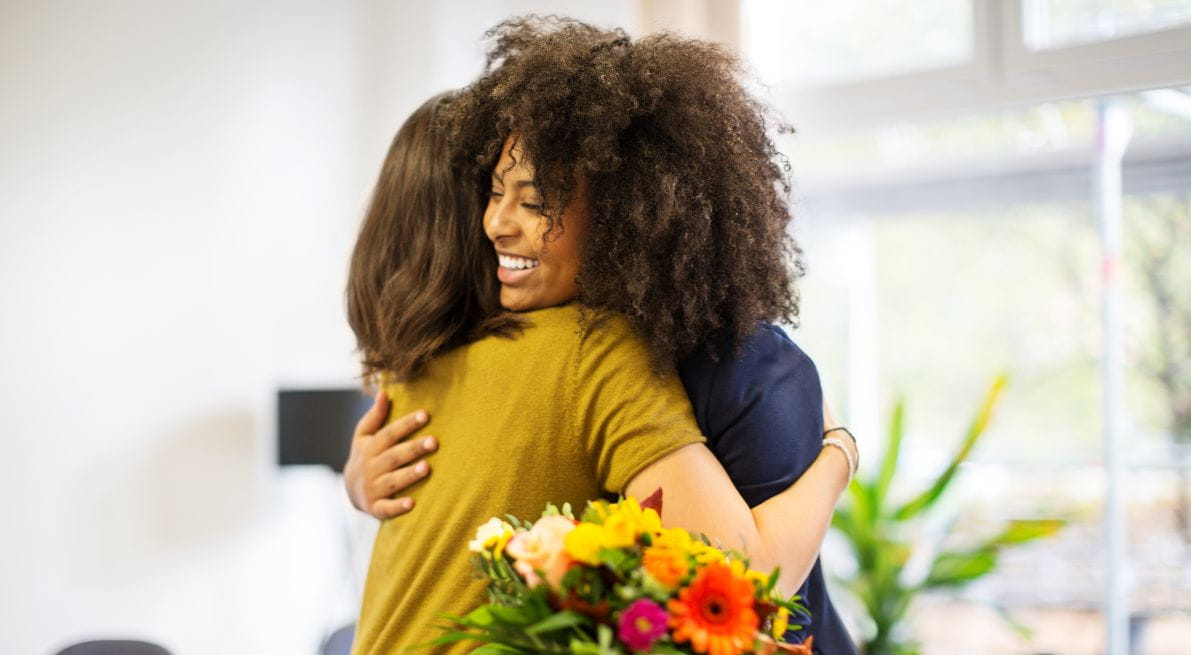 Two people hugging