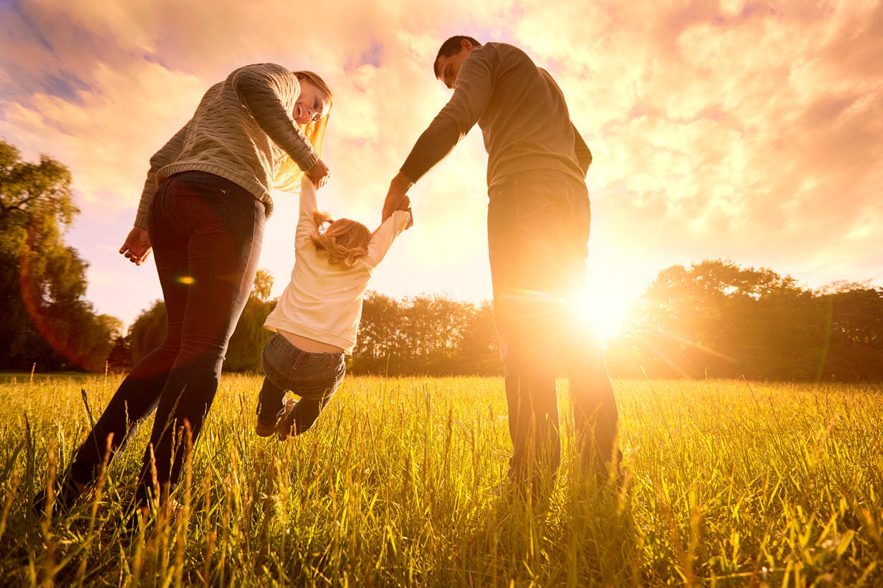 happy family at sunset